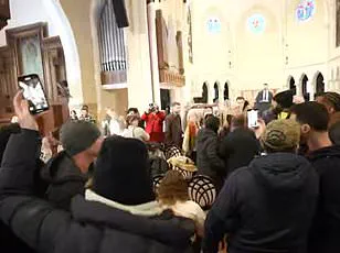 Minneapolis Pastor's Dual Role as ICE Official and Church Leader Ignites Controversy After Left-Wing Mob Storms Worship Site