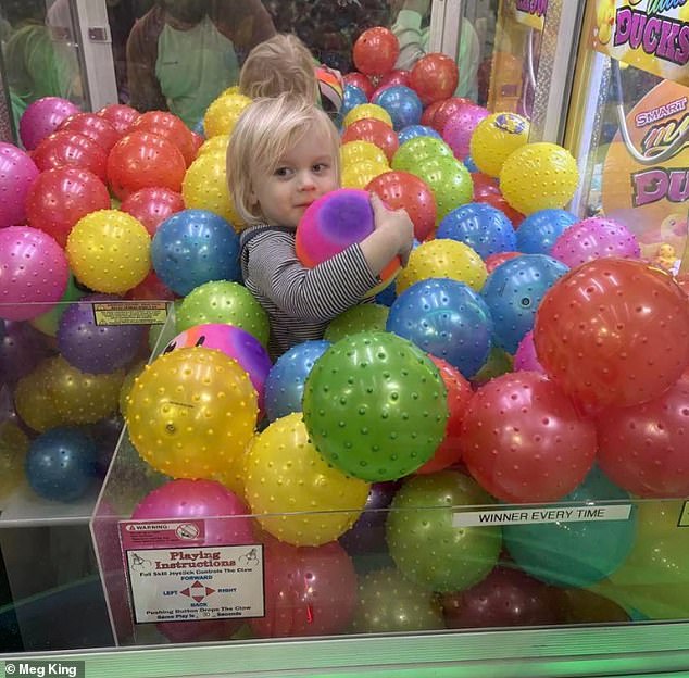 Two-Year-Old's Claw Machine Mishap Goes Viral, Captivating Internet and Parents Alike