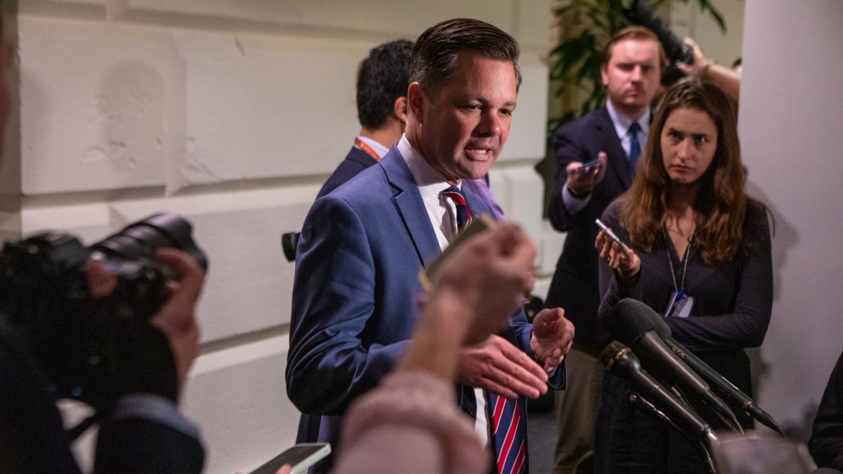 Campaigner Sarah Trone Garriott faces backlash after revealing she officiated a satanic wedding.