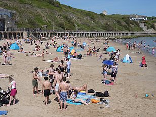 Unprecedented UK heatwave intensifies climate change debate as temperatures soar.
