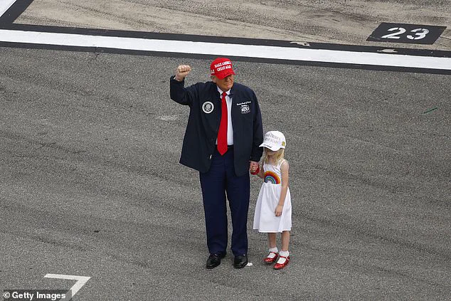 Carolina Trump waves to fans from grandfather's limousine at Daytona 500