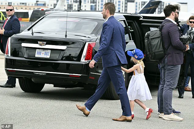 Carolina Trump waves to fans from grandfather's limousine at Daytona 500