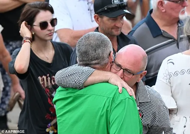 Shark attack victim's father pleads for people to continue visiting beaches