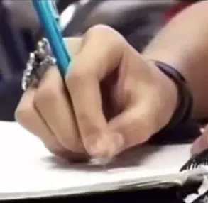 Taylor Swift's Unusual Pencil Grip Revealed in 2006 Video