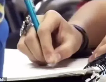Taylor Swift's Unusual Pencil Grip Revealed in 2006 Video