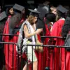 Aydan Nix Honors Palestinian Heritage with Keffiyeh Scarf at Parsons Graduation